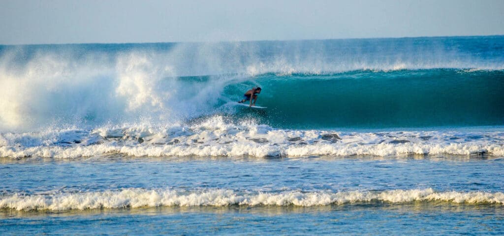 surfer in the tube at Dominical
