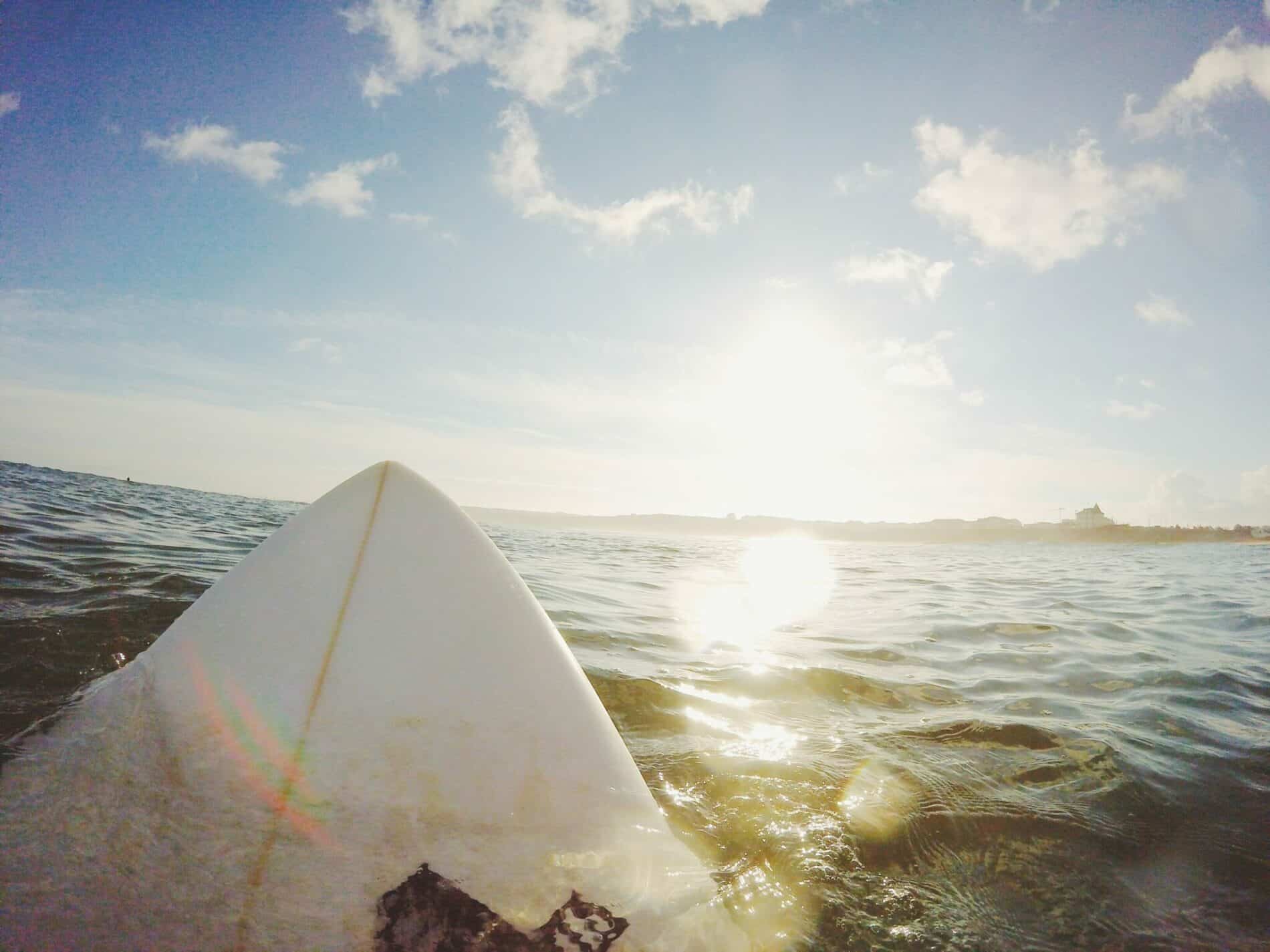 surfing session at sunset caparica portugal